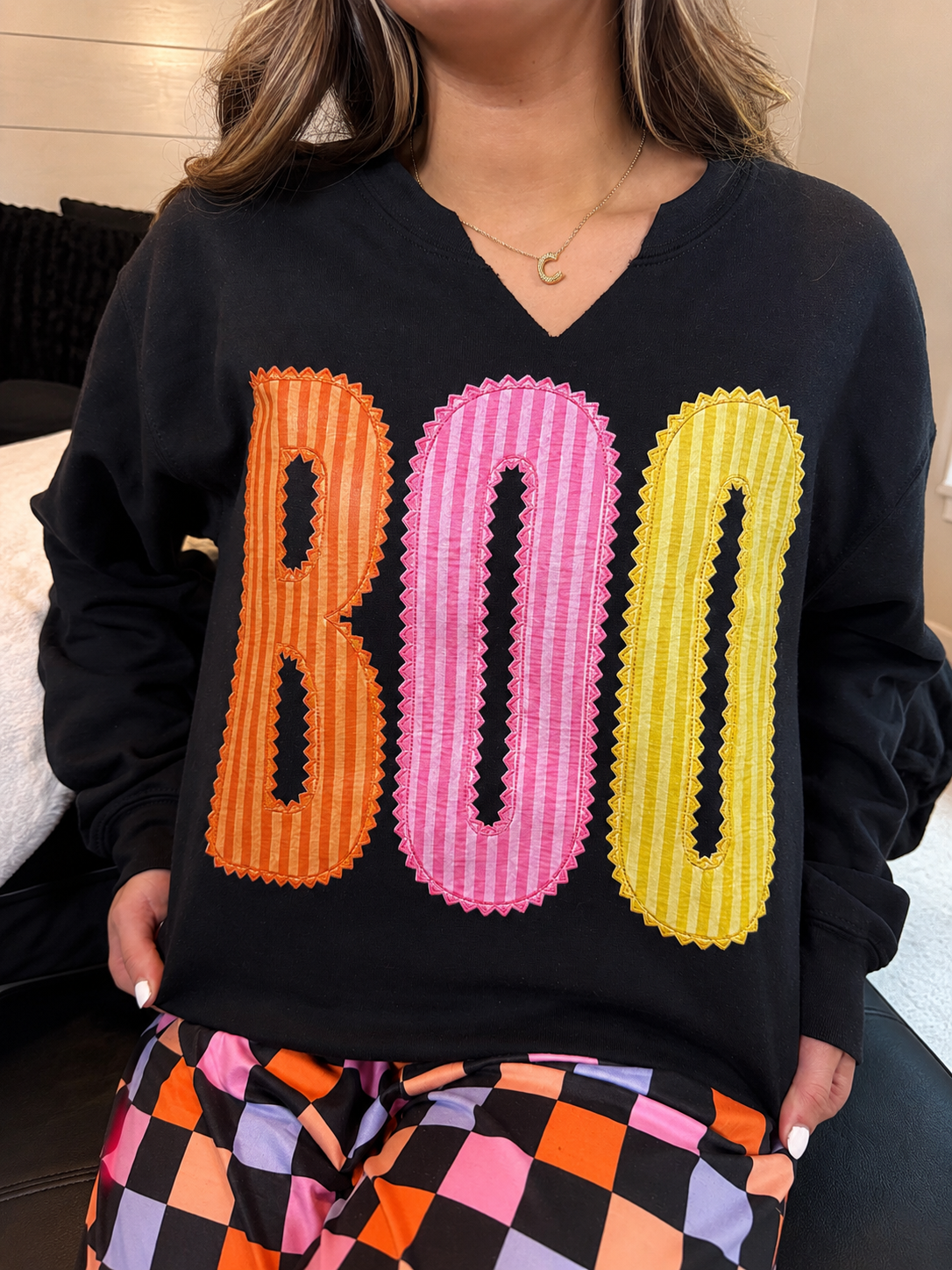 Boo Checkered Split Neck Crewneck: BLACK